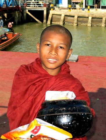 A young monk welcomed us to Myanmar.